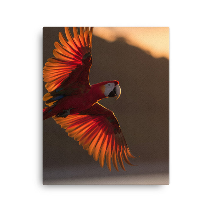 Scarlet Macaw flying over a beach at sunset Canvas - PosterfyAI.com