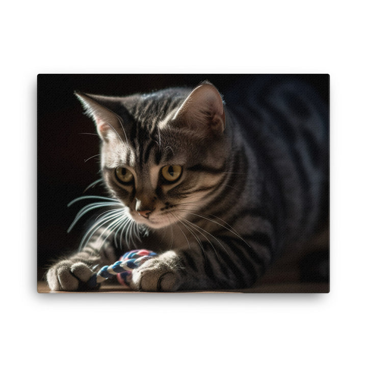 Adorable American Shorthair playing with toy mouse canvas - Posterfy.AI